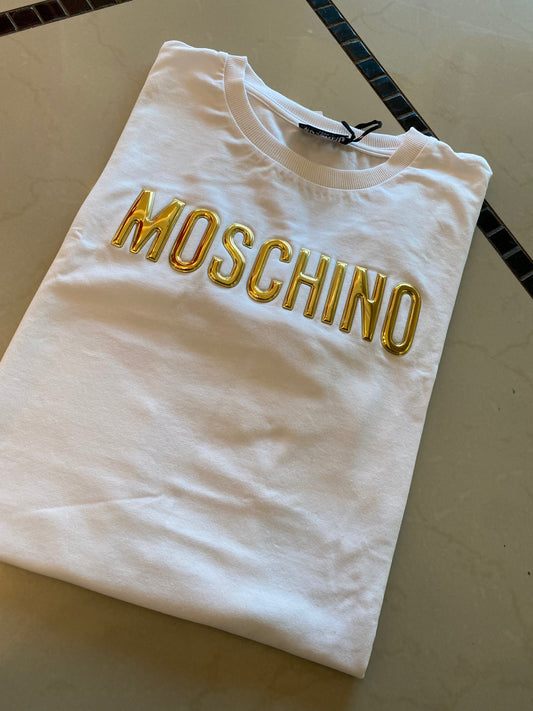 PLAYERA DAMA MC CON LOGO SALTADO DORADO